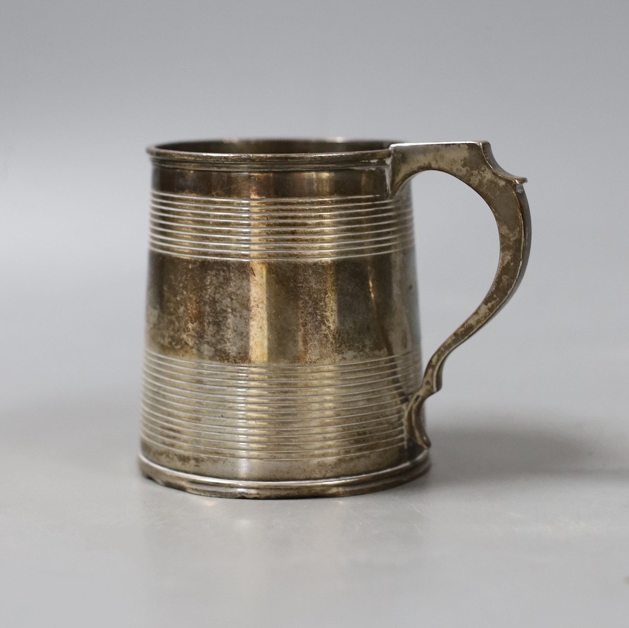 A George IV silver mug, with reeded bands and later? engraved initials, Robert Peppin, London, 1823, 83mm, 6.5oz.